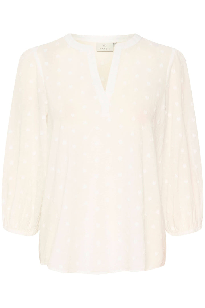 Blouse Jollia crème à manches 3/4, encolure en V, avec motifs à pois, parfaite pour un look décontracté.