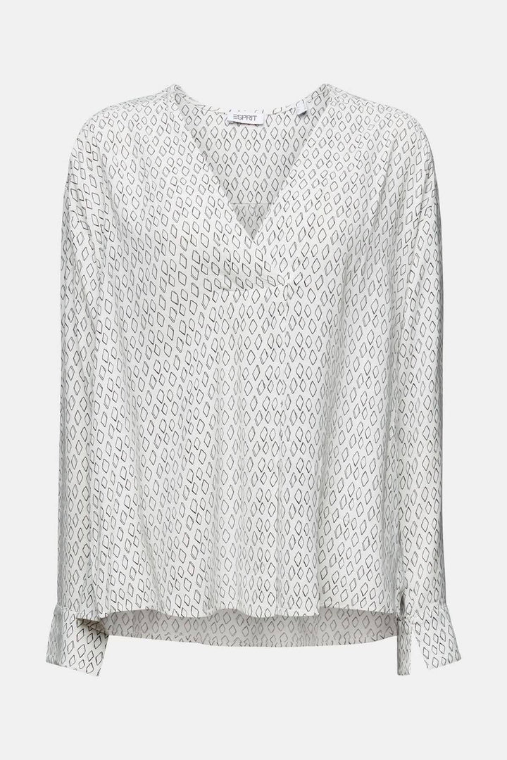 Blouse col V ample en tissu crêpe texturé, imprimé intégral et manches tombantes, parfaite pour le bureau.