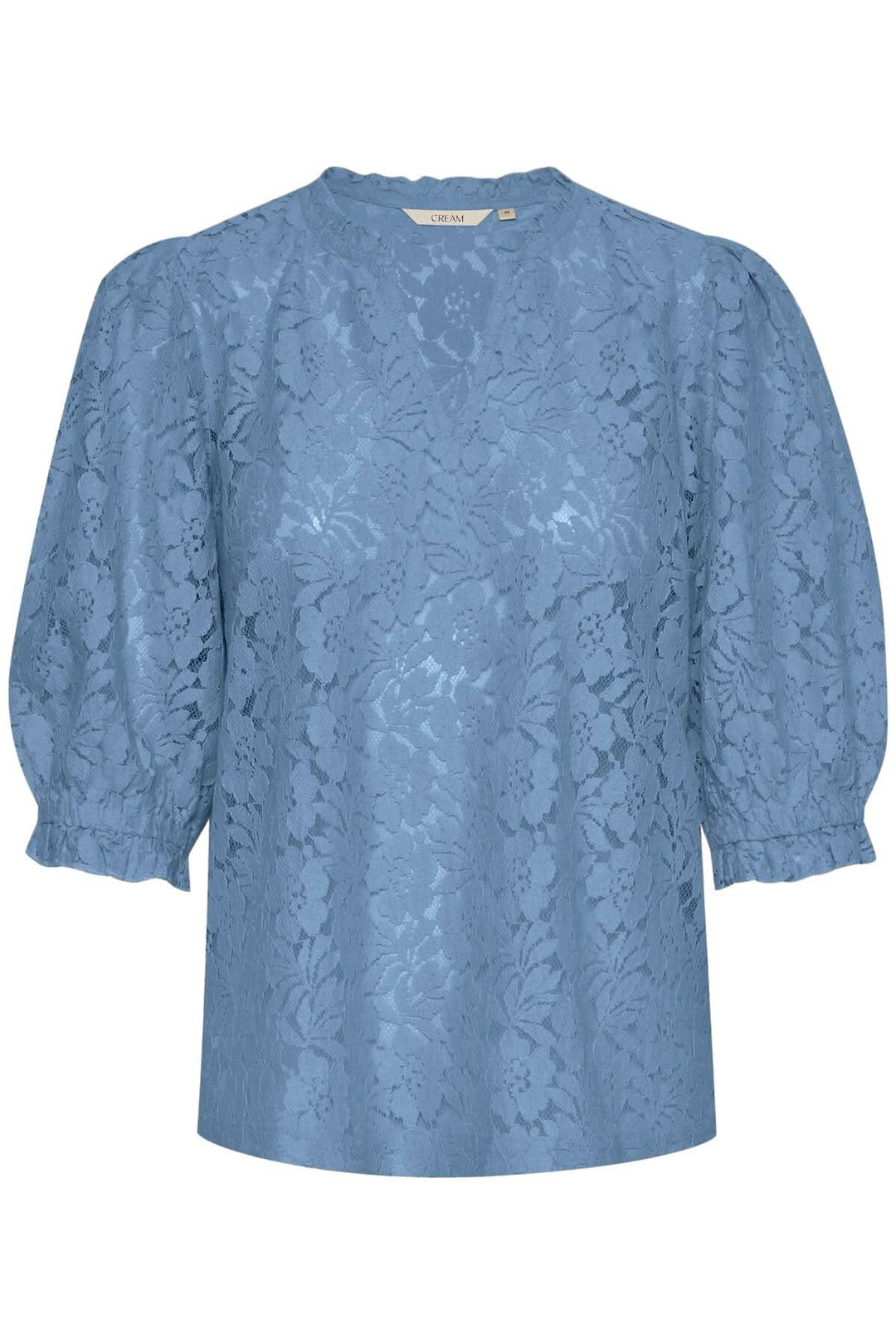 Blouse de Kaspis en bleu, en maille avec manches bouffantes, forme A pour une élégance décontractée.