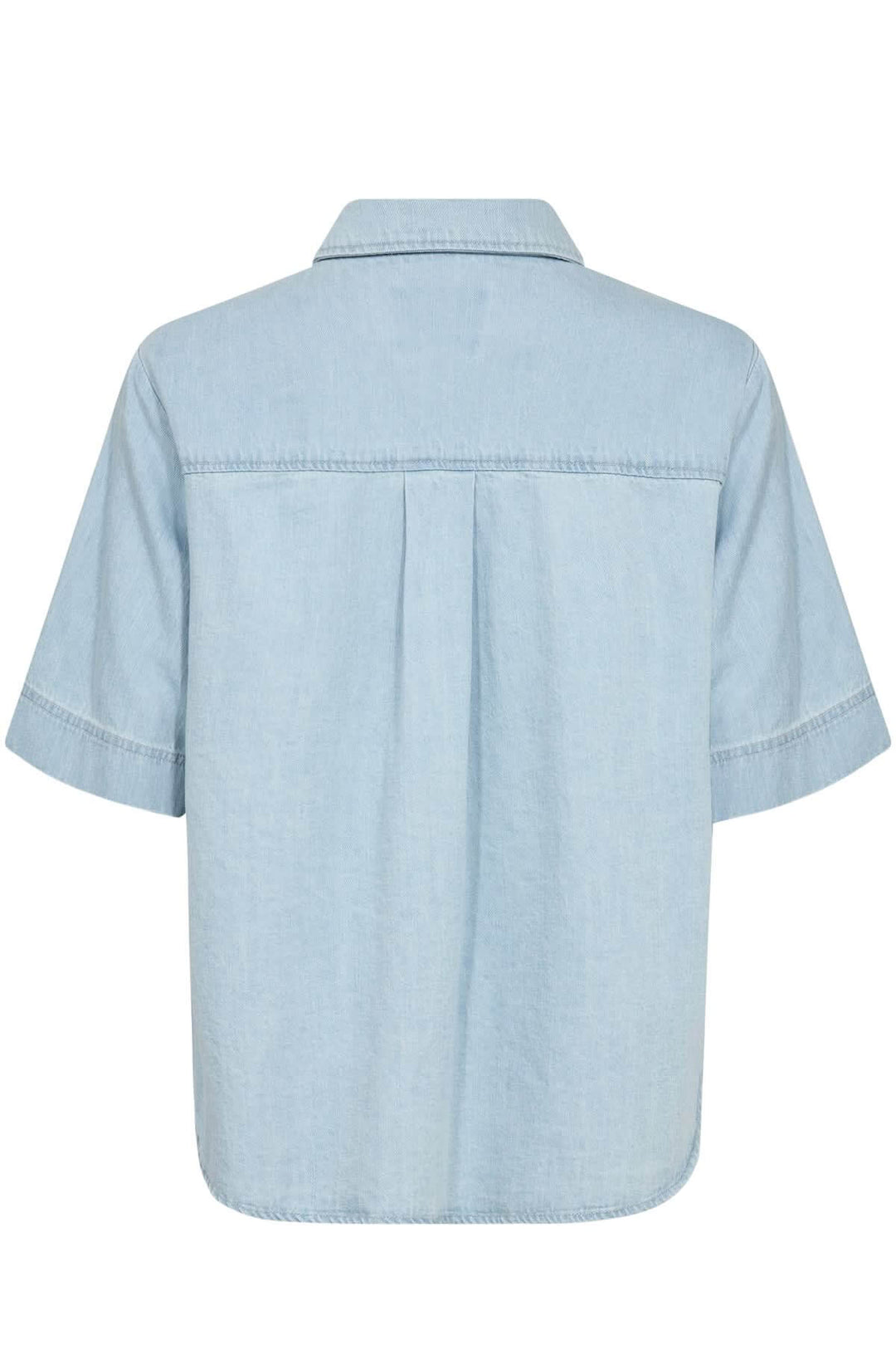 Dos d'une blouse en jeans Nicla, courte et décontractée, avec un délavage léger et une coupe structurée.