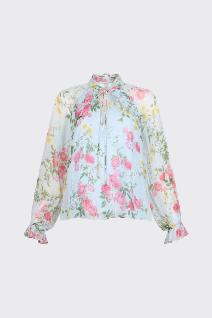 Blouse fluide à imprimé floral avec manches bouffantes et encolure en V, tissu délicat, style romantique et élégant.