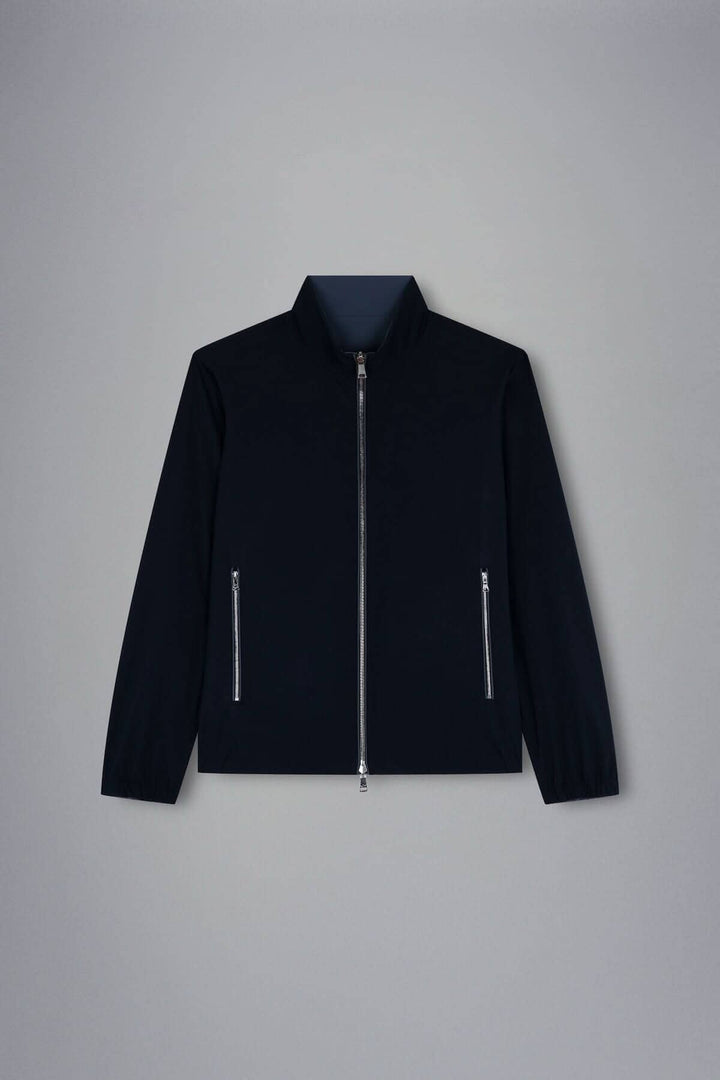 Blouson imperméable réversible noir avec fermeture éclair et poches devant.