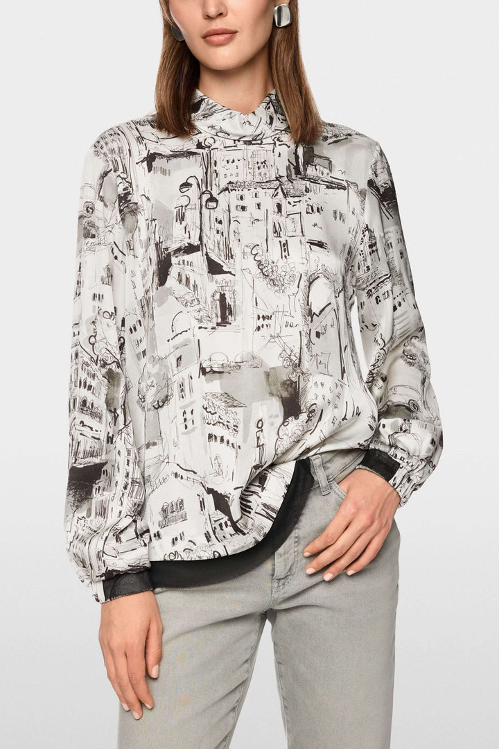 Blouse à imprimé CITY, manches longues, motif artistique urbain, col montant, tenue élégante et moderne.