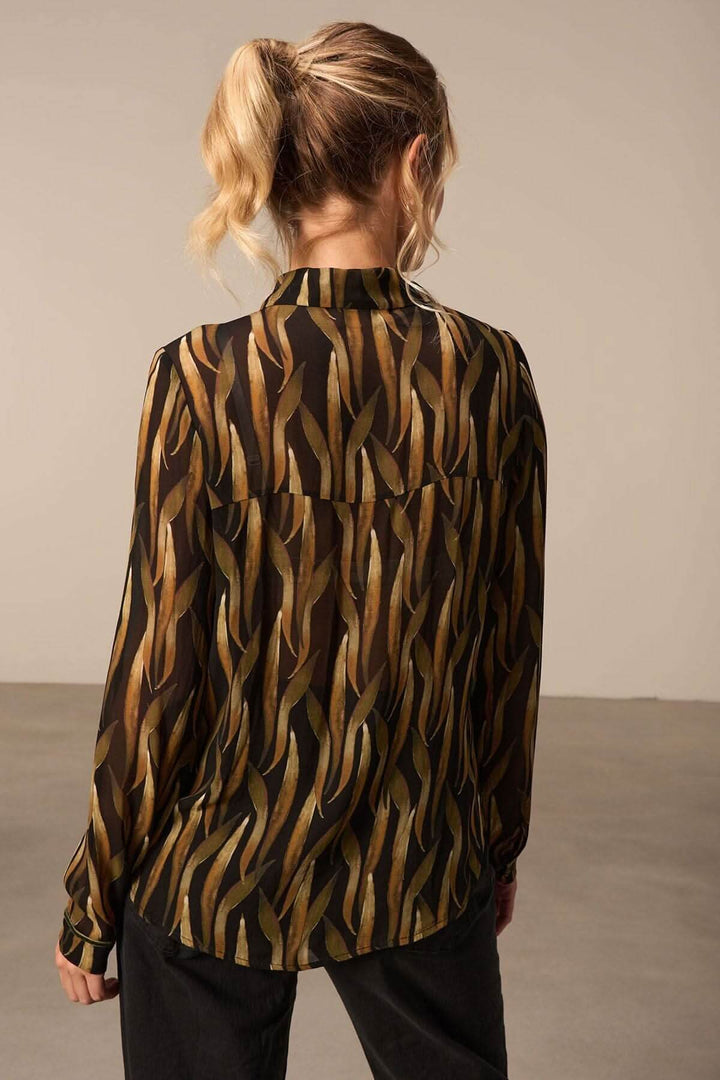 Blouse imprimée à motifs végétaux, manches longues, vue de dos, élégante et chic.