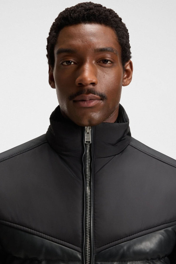 Blouson en cuir d’agneau avec col montant et finitions côtelées