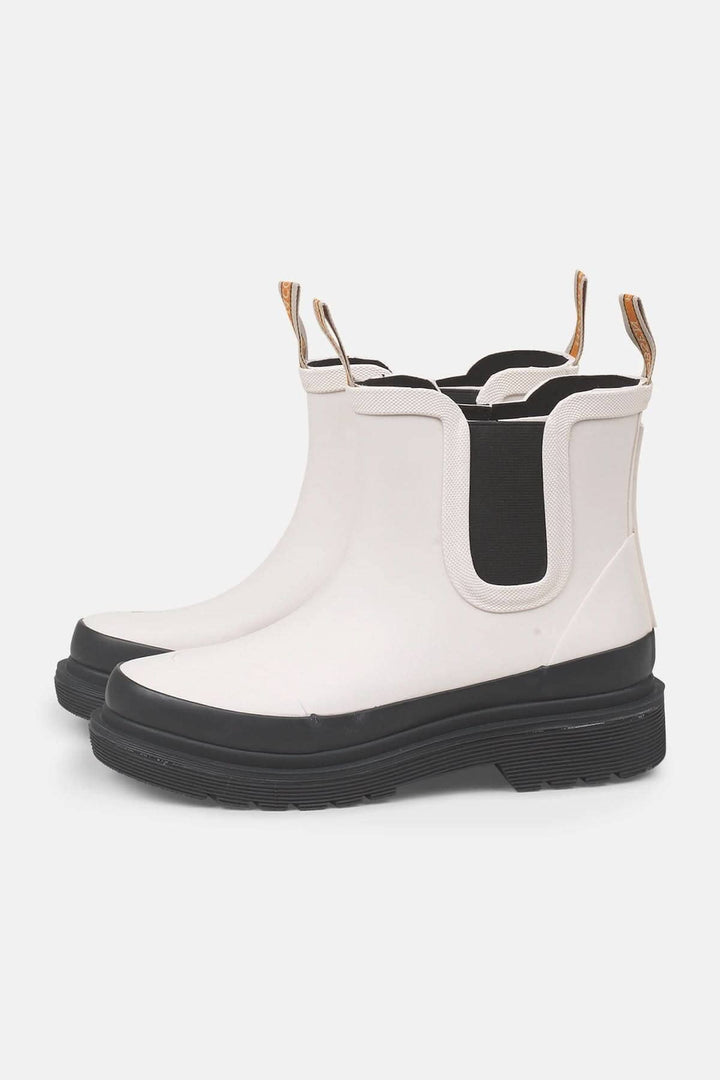 Bottes Chelsea en caoutchouc blanches, imperméables et confortables, idéales pour temps froid et humide.