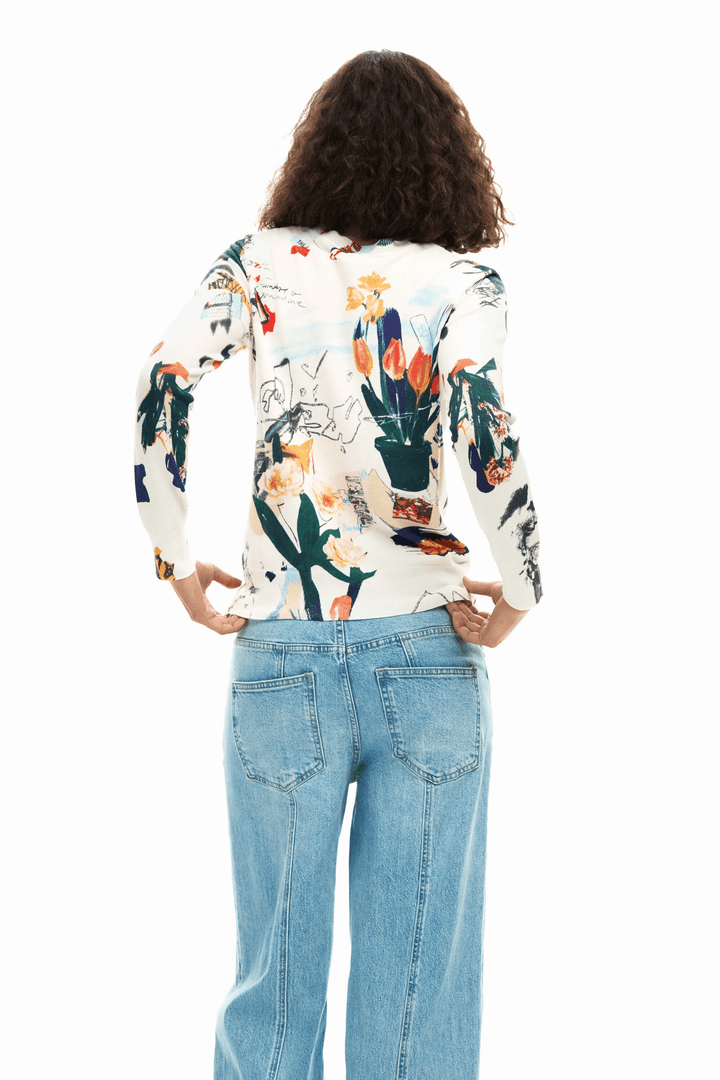 Chandail fin avec plantes, manches longues, motif artistique, coupe ajustée, femme de dos, tenue quotidienne, style polyvalent.