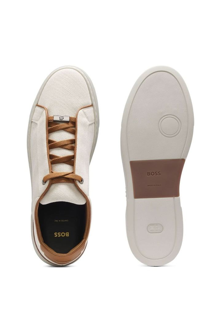 Chaussure de ville Ecru élégante avec finitions en cuir, lacets élastiqués pour style décontracté et maintien, vue dessus et dessous.