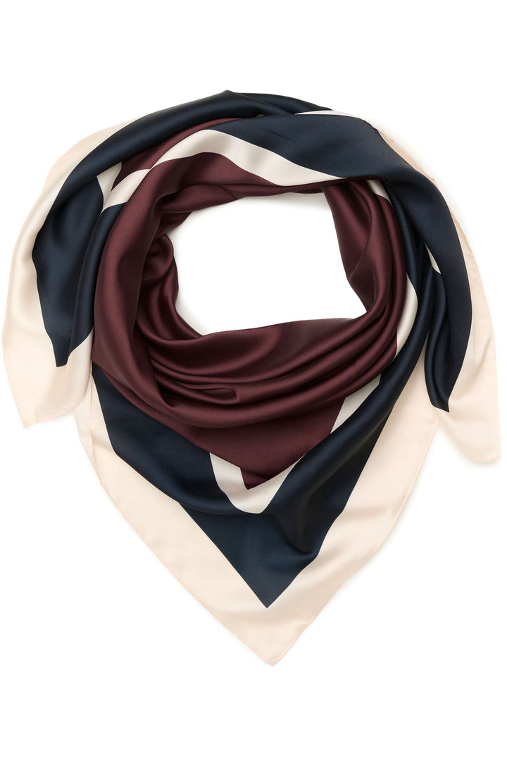 Foulard Namira bicolore élégant avec motif graphique, léger et soyeux, parfait pour accessoriser vos tenues.