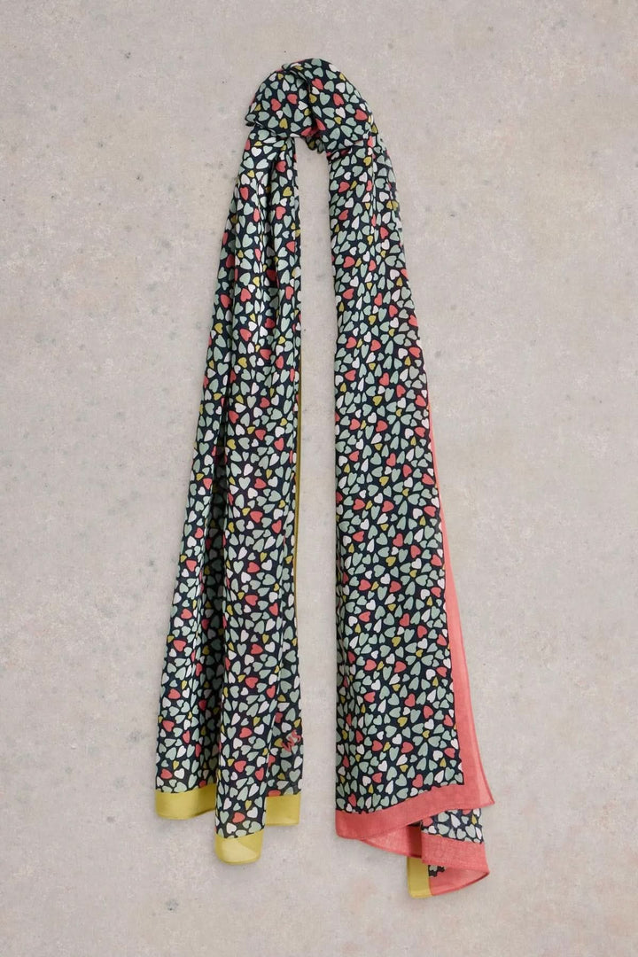 Foulard Sophie, foulard léger à motifs colorés avec bordures contrastantes, pour un look élégant et polyvalent.