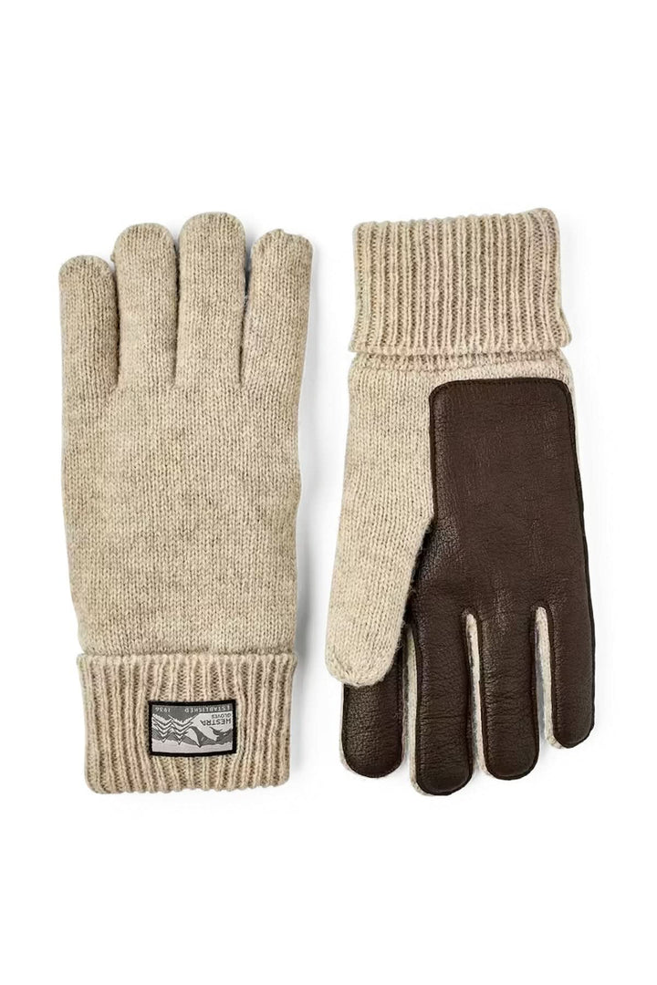 Gants en maille beige avec poignets côtelés et paume en cuir, confortables et polyvalents pour temps frais.