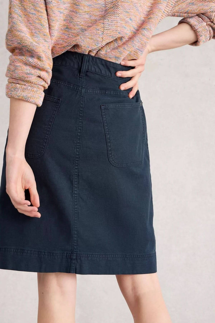 Jupe Tia, jupe droite à taille haute, tissu souple, idéale pour un look élégant et décontracté.