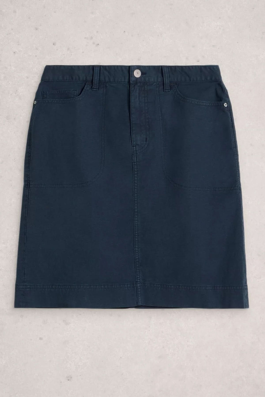 Jupe Tia droite à taille haute, en tissu souple, idéale pour un look urbain chic.