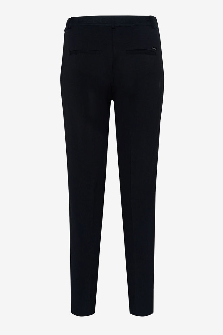 Pantalon maron S avec élastique, coupe fuselée, poches arrière, vue arrière, style décontracté.