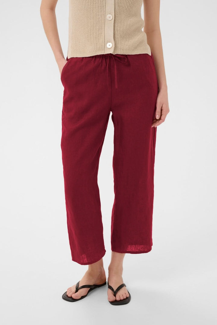 Pantalon de lin Berita rouge fluide et confortable avec taille élastique et cordon, coupe droite, idéal pour l&