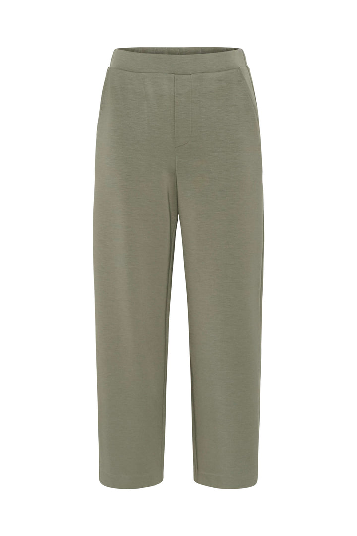 Pantalon à jambe large Gincette, style épuré et contemporain, coupe droite ample, tissu souple et extensible, silhouette élégante.