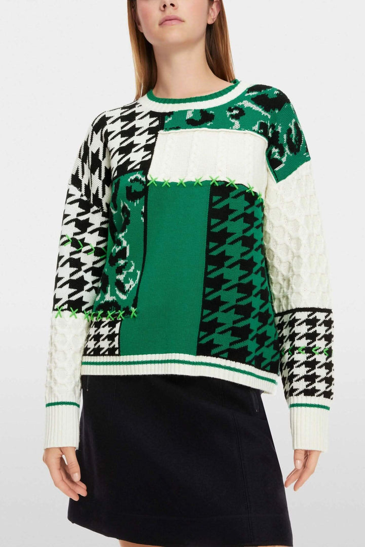 Pull en maille à motifs mélangés, à col rond, en pure laine, avec design patchwork coloré.