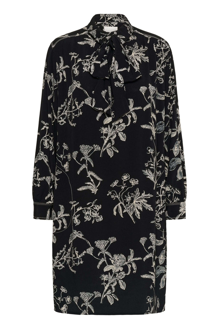 Robe Sanes: robe fluide à imprimé floral avec col lavallière et manches bouffantes. Idéale avec bottes hautes ou escarpins.