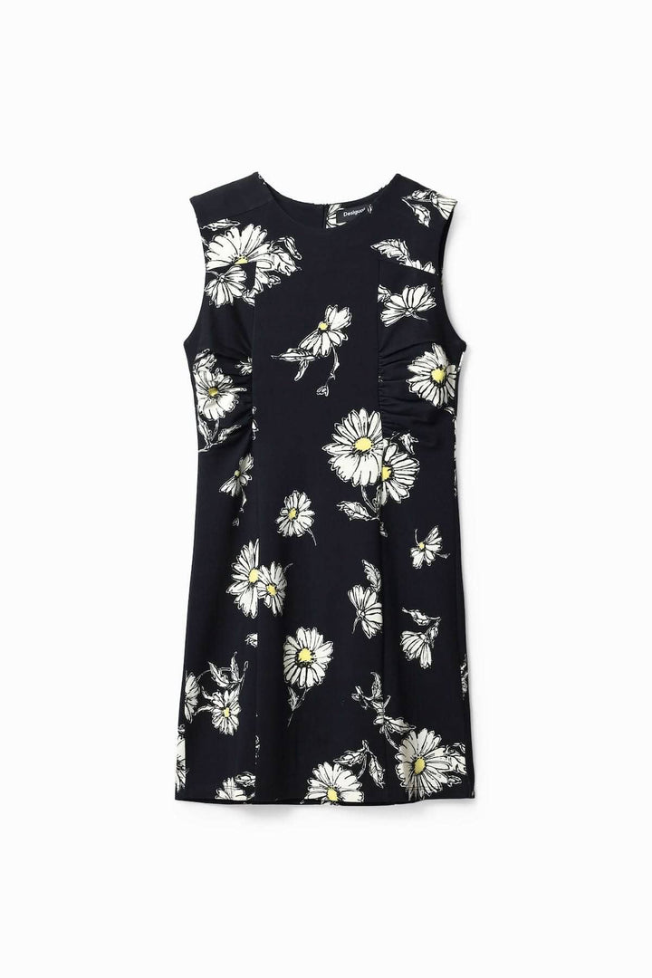 Robe courte sans manches avec imprimé de marguerites sur fond noir, parfaite pour les journées chaudes.