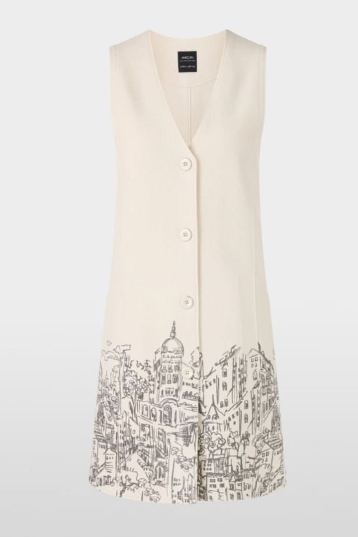 Robe en laine bouillie sans manches avec imprimé urbain artistique sur le devant, fabriquée en Allemagne. Patte de boutonnage visible.