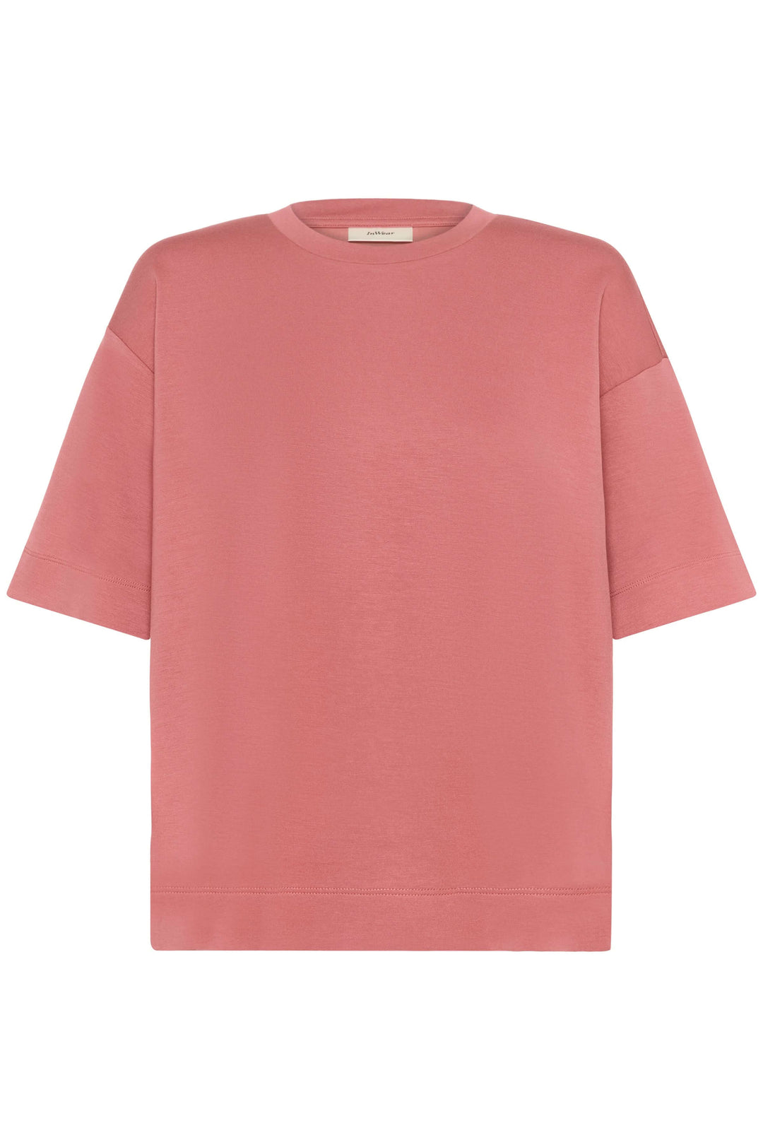 T-shirt coupe ample Pannie en rose avec manches courtes et col rond, confortable pour un style décontracté et épuré.
