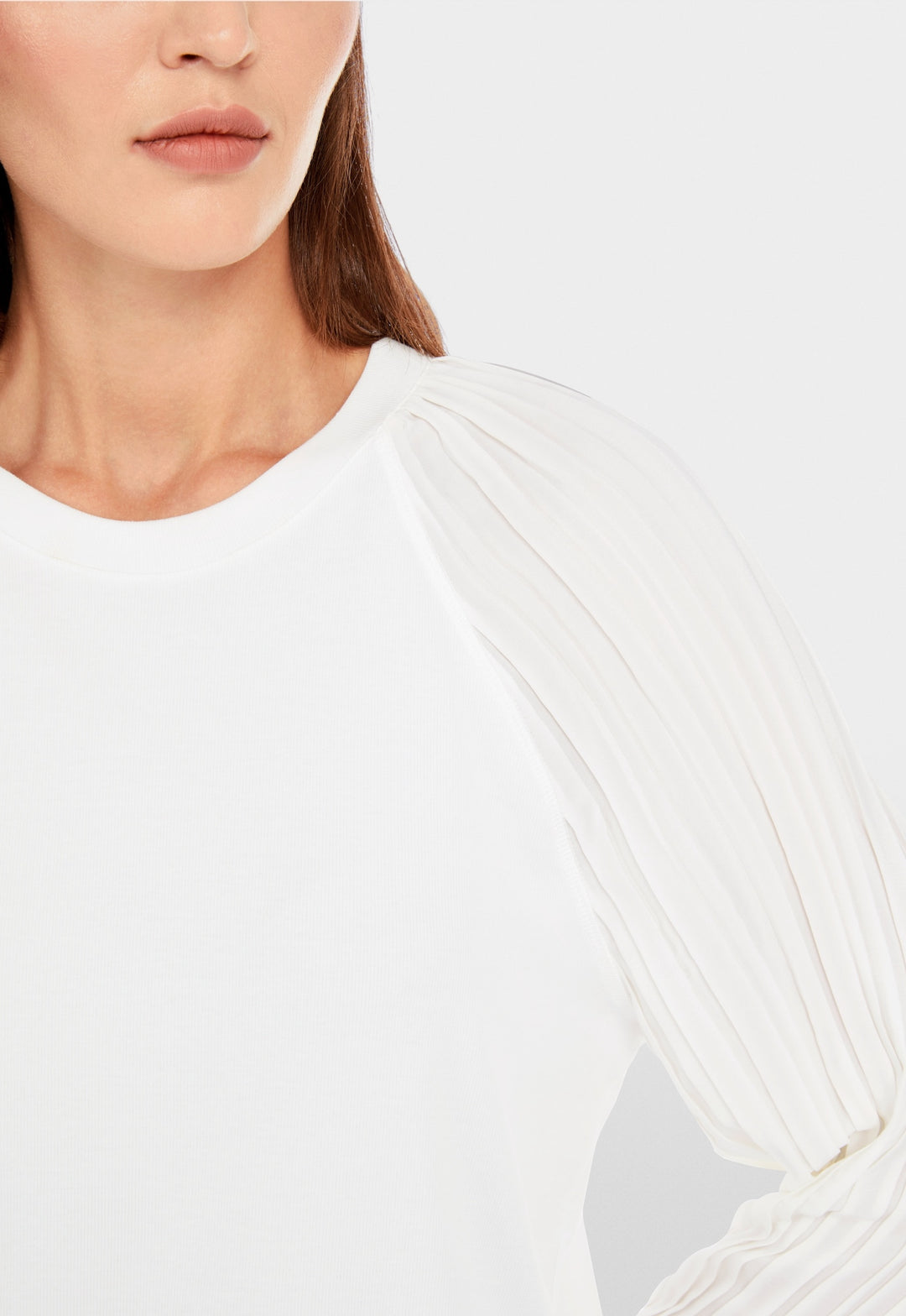 Blouse unie avec manches plissées