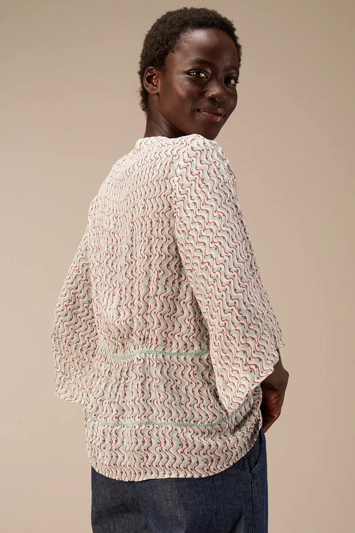 Front view of the flowing Nile printed blouse for women with multicolored floral patterns - Valérie Simon