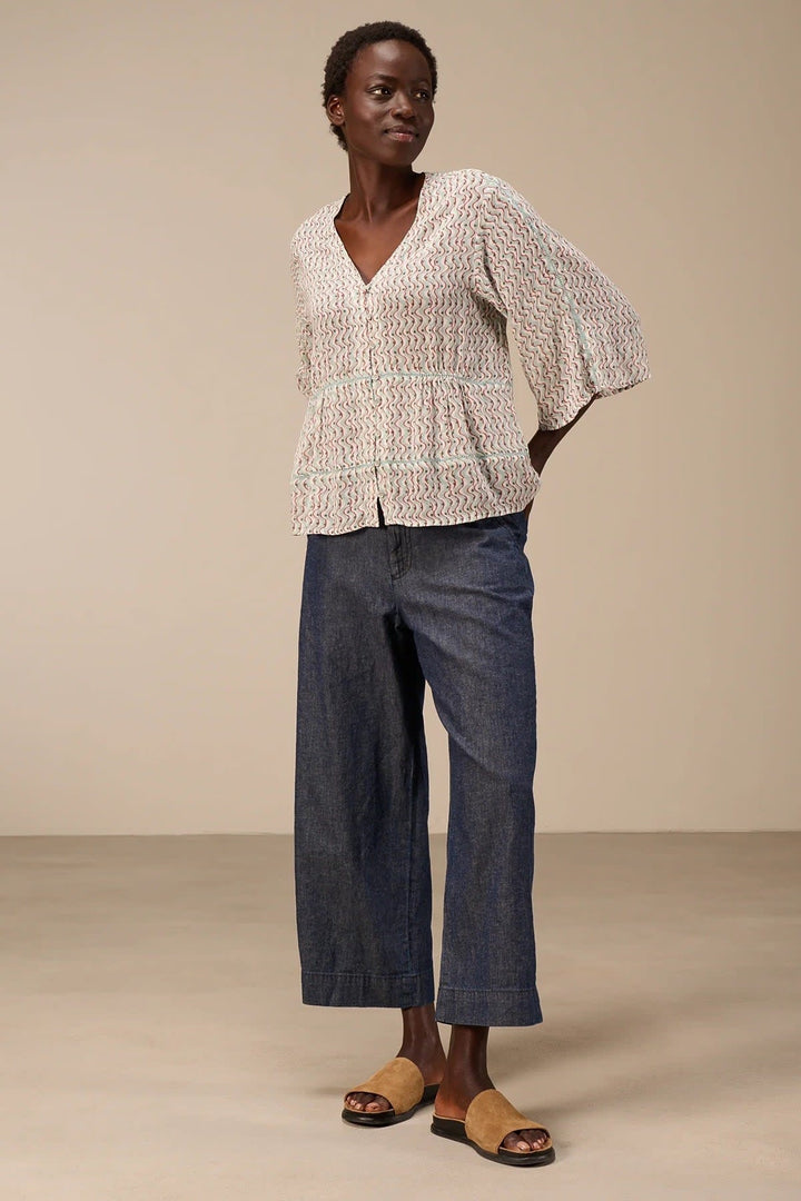 Front view of the Nile-print flowing blouse for women in beige with floral motifs - Valérie Simon
