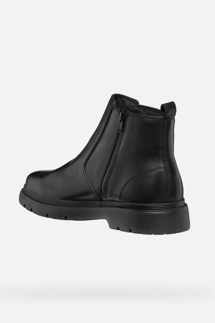 Vue latérale botte Chelsea Geox en cuir noir avec élastiques latéraux pour homme - Valérie Simon