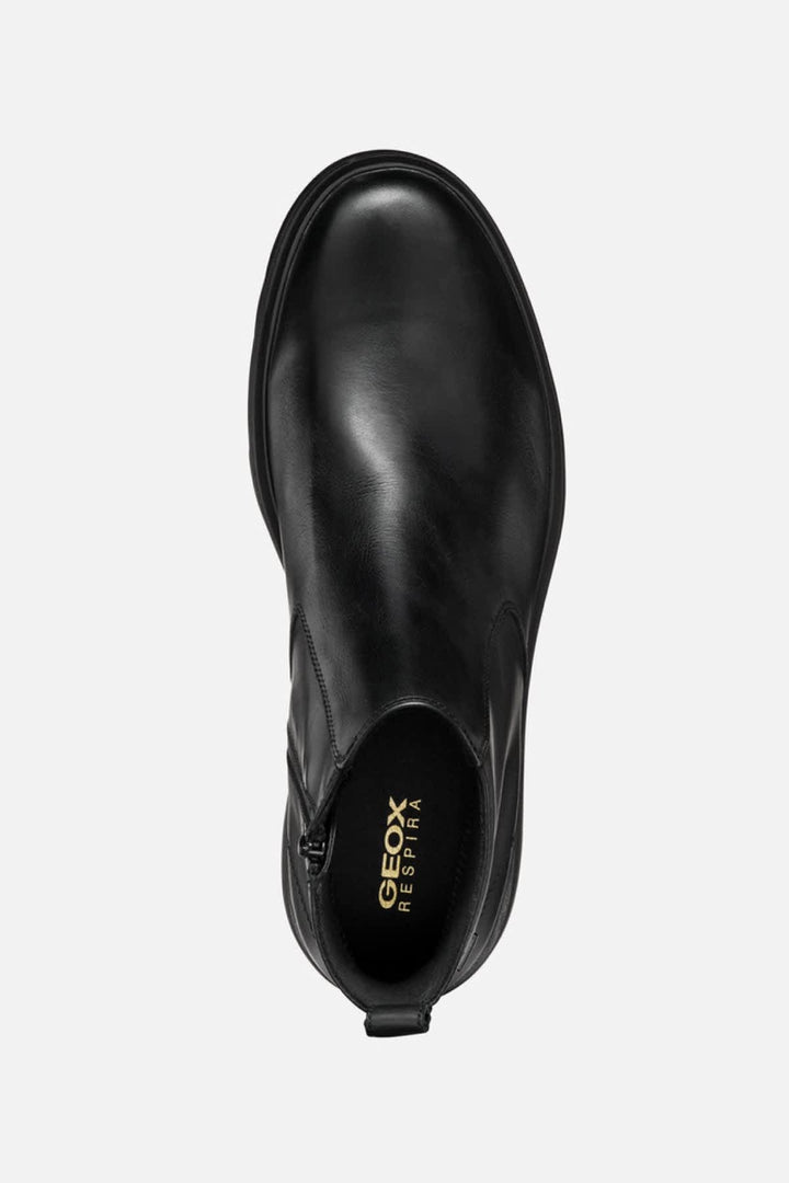 Vue de côté Botte Chelsea Geox pour homme en cuir noir avec détails élastiques - Valérie Simon