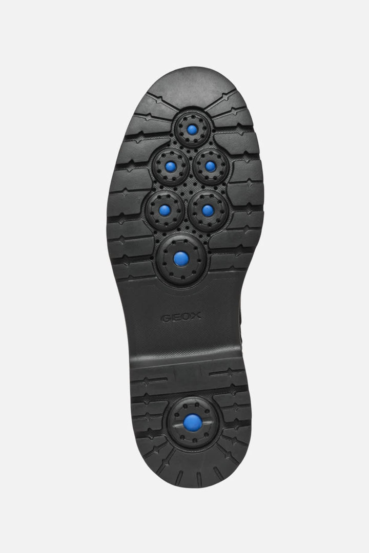 Vue latérale botte Chelsea Geox en cuir noir pour homme avec couture décorative - Valérie Simon