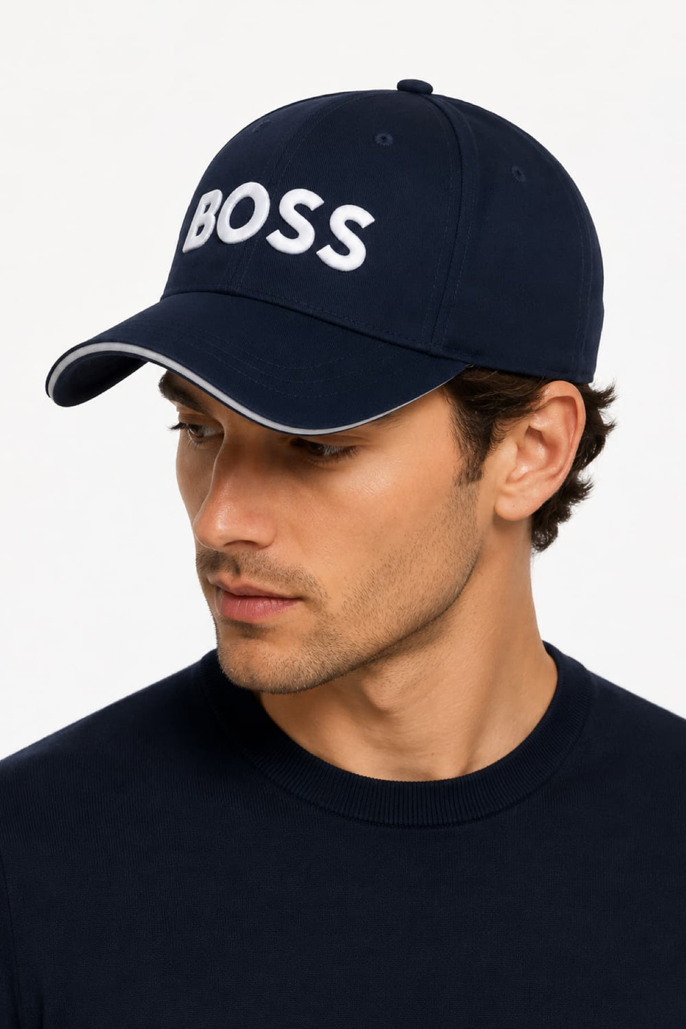 Front view of a black men's cap with embroidered BOSS logo - Valérie Simon