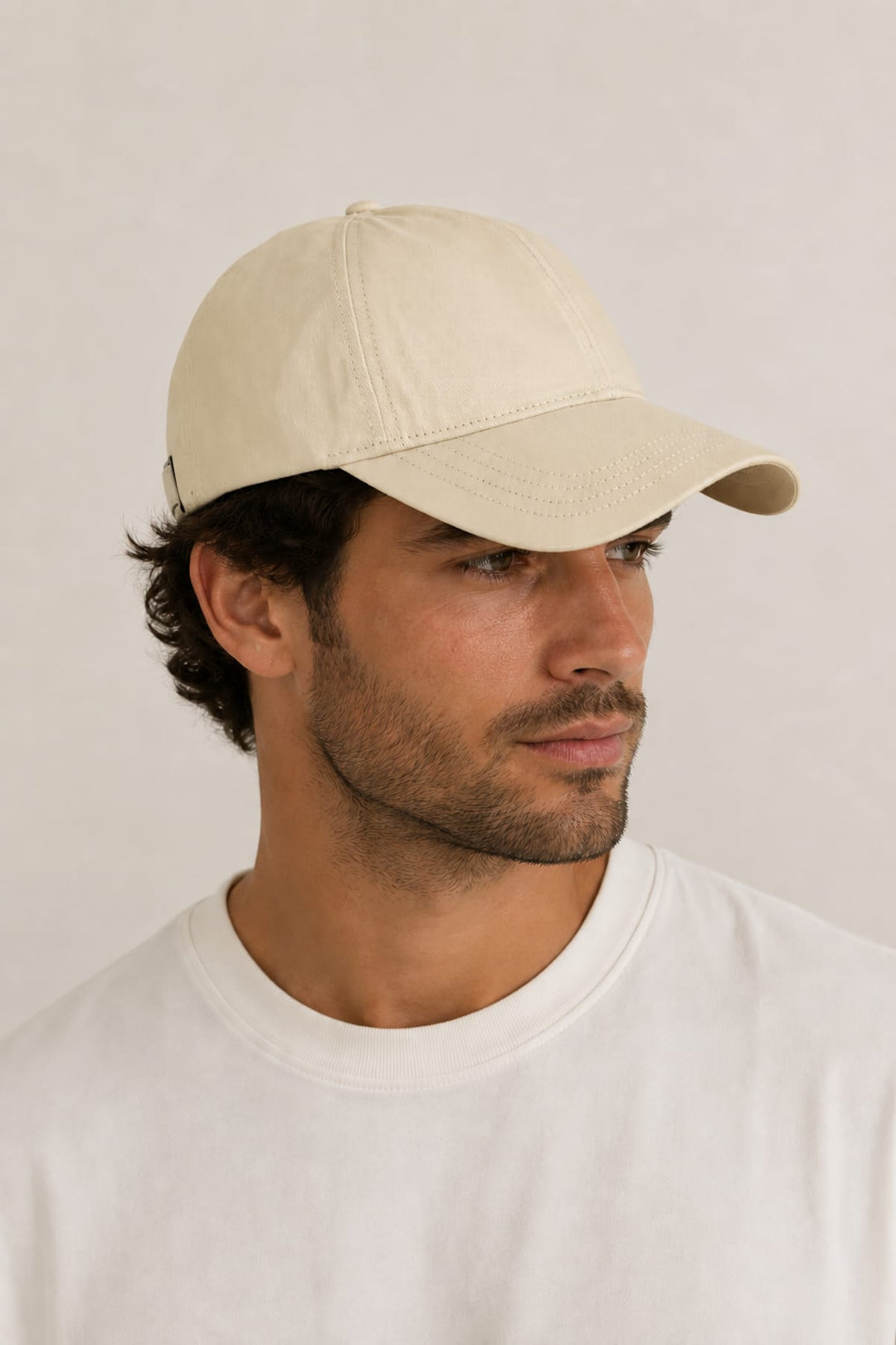 FAILSWORTH Essential Adjustable Cap for Men (side view), colour black, with a subtle embroidered logo - Valérie Simon