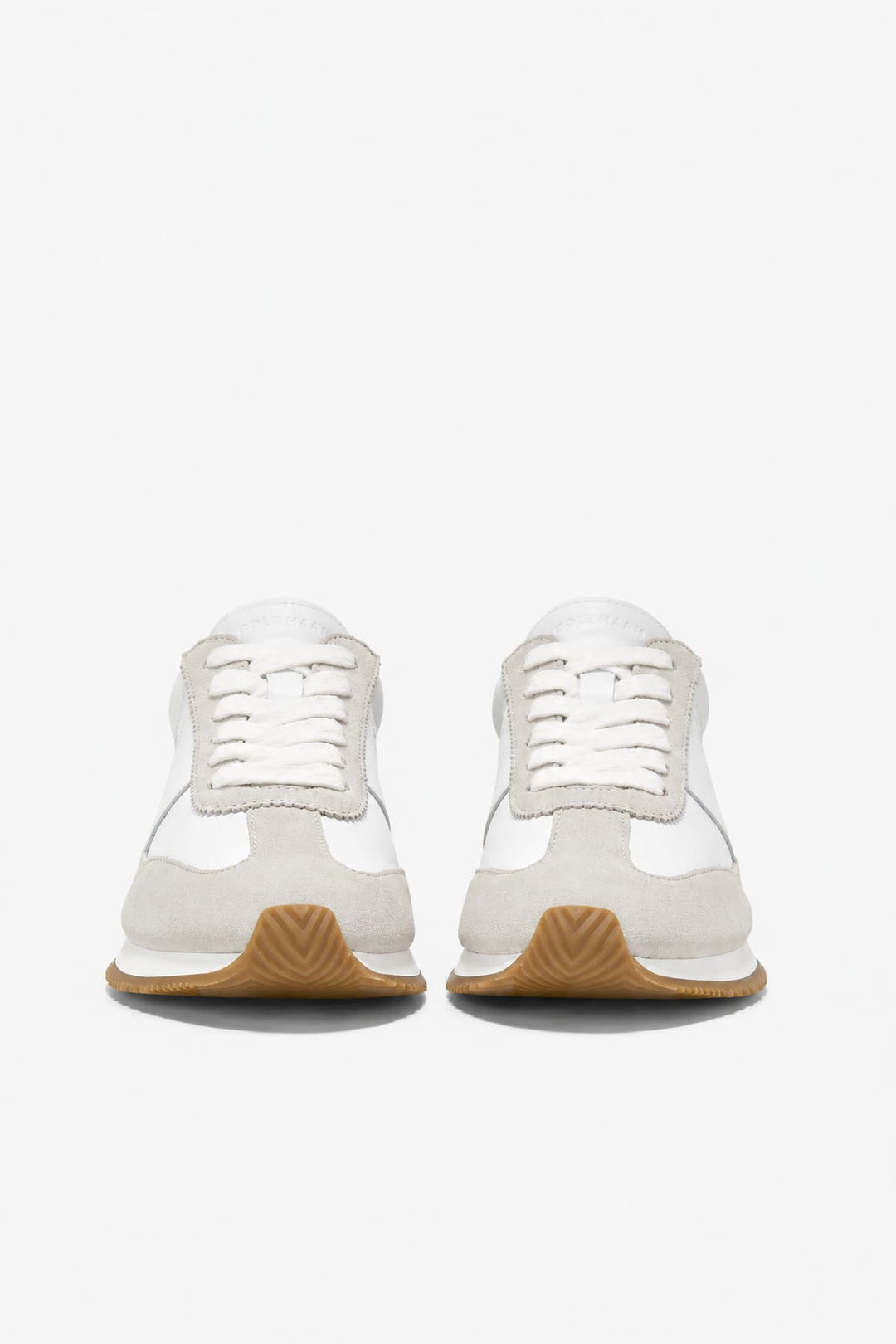 Side view of the Davie Runner leather and suede dress shoes for women by Cole Haan