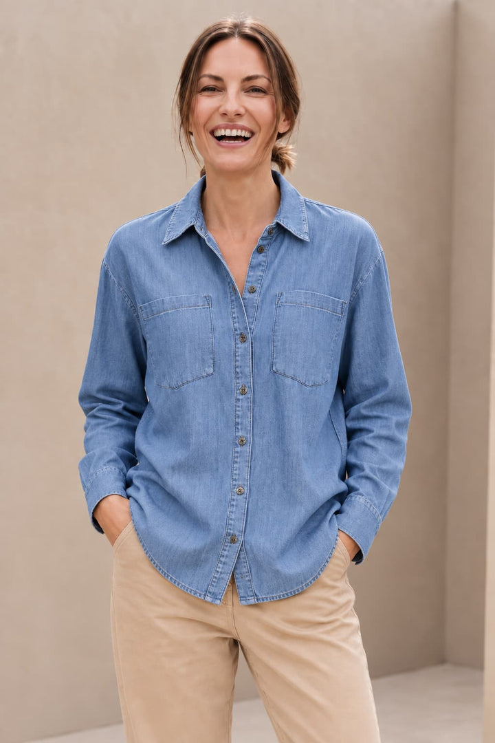 Blue denim shirt with patch pockets, front view, for women kennys