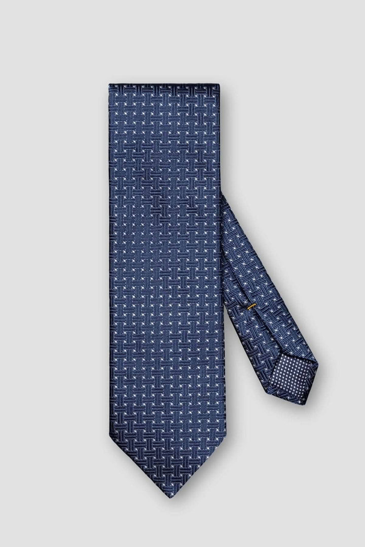 Cravate en soie bleue à motif géométrique moderne, idéale pour les occasions formelles.