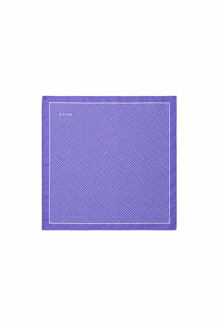 Close-up of a blue and white Eton silk polka-dot pocket square for men - Valérie Simon