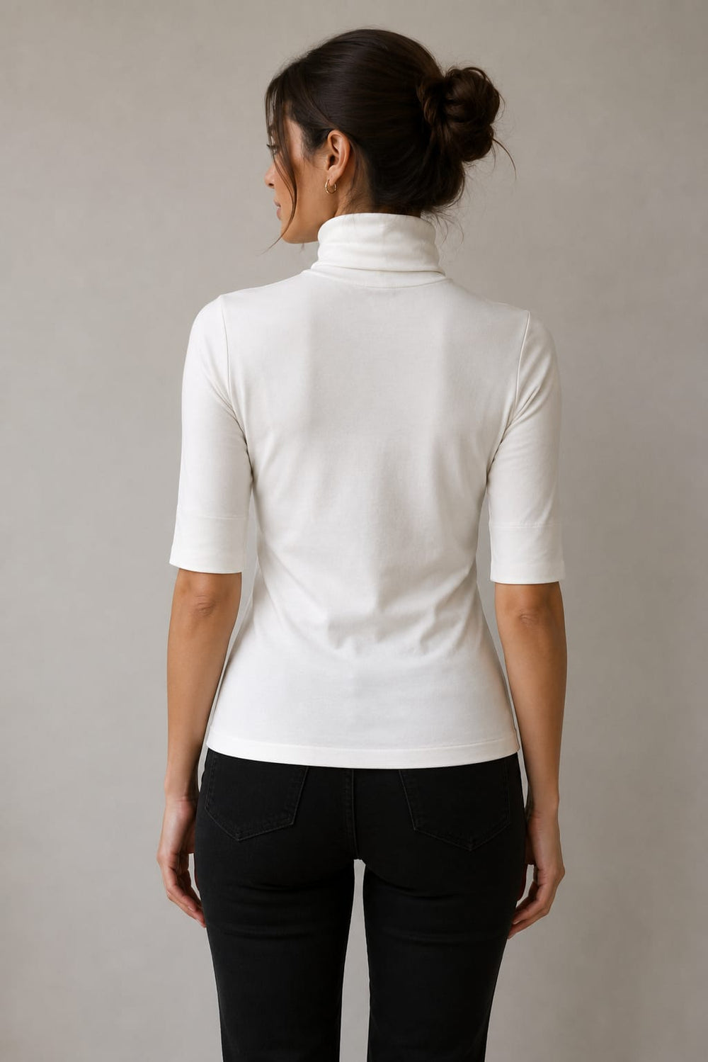 Front view of a black Marc Cain women's turtleneck with 3/4 sleeves - Valérie Simon