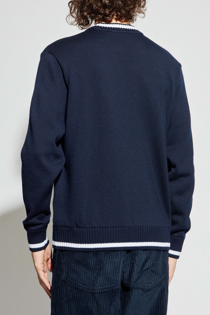 Chandail col rond bleu marine avec bandes contrastantes au col et à la taille, vue arrière.