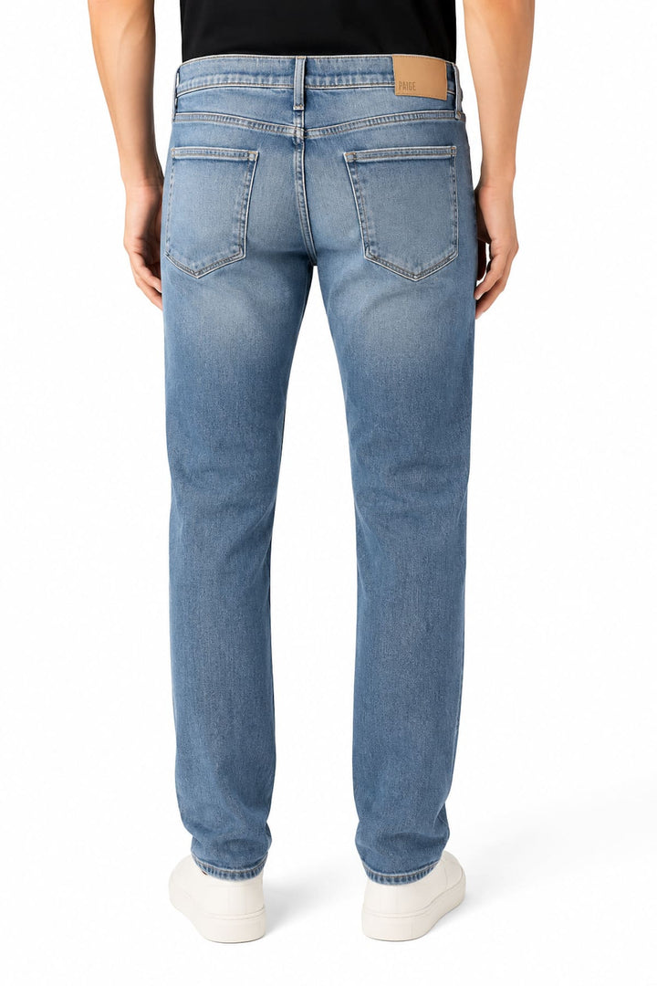 Vue de côté jean délavé Paige pour homme gris avec poches arrière visibles - Valérie Simon