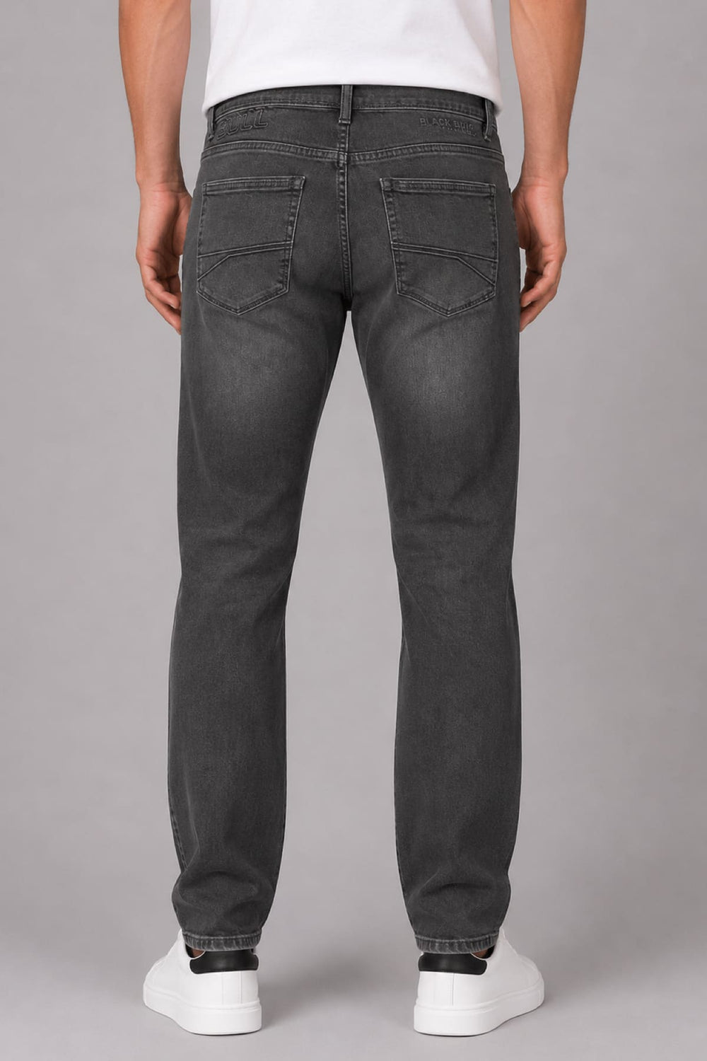 Side view of the modern Black Bull men's blue jeans Fit with exposed stitching - Valérie Simon