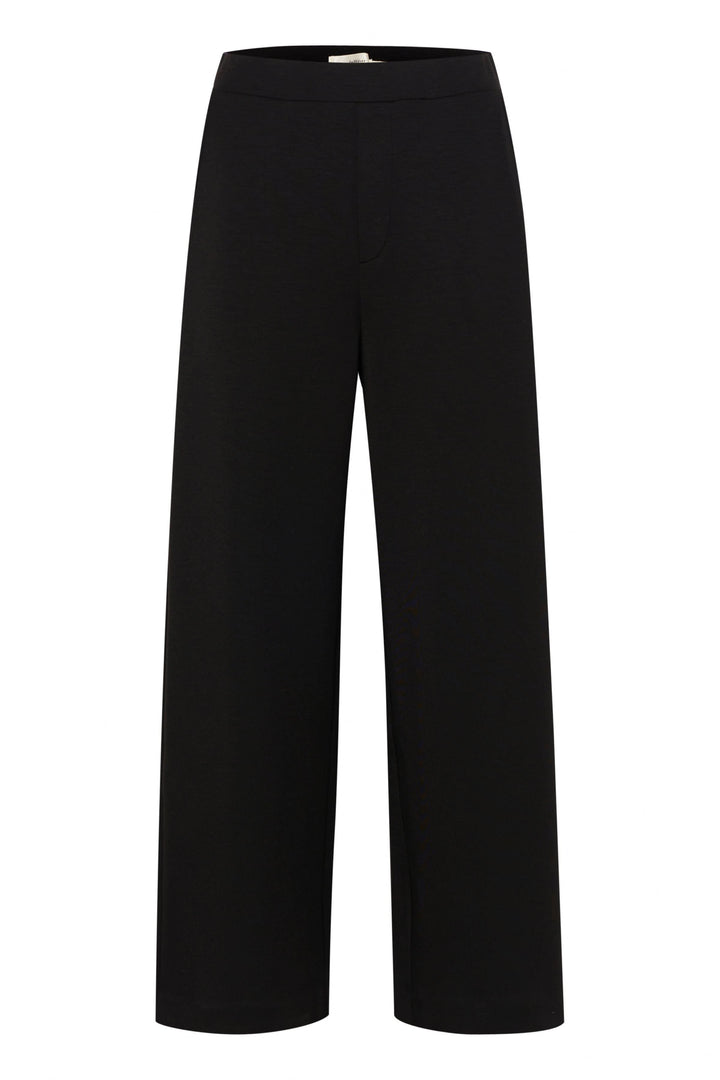 Pantalon Gincette noir à jambe large en jersey fluide, taille élastique pour confort et élégance.