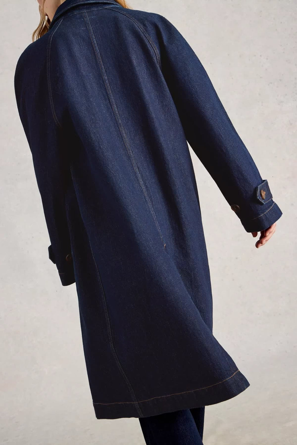 Side view of women's blue long denim coat White Stuff with patch pockets - Valérie Simon