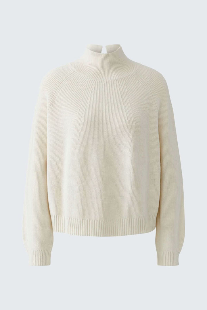 Tricot à col montant style raglan vue de face pour femme Oui