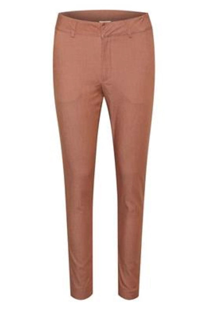 Pantalon Chino élégant en tissu léger, idéal pour l'été, facile à assortir avec un haut blanc.