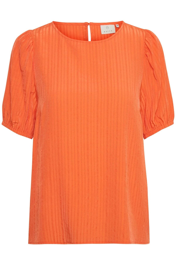 Blouse Silvia en orange avec manches bouffantes, parfaite pour compléter votre garde-robe estivale.