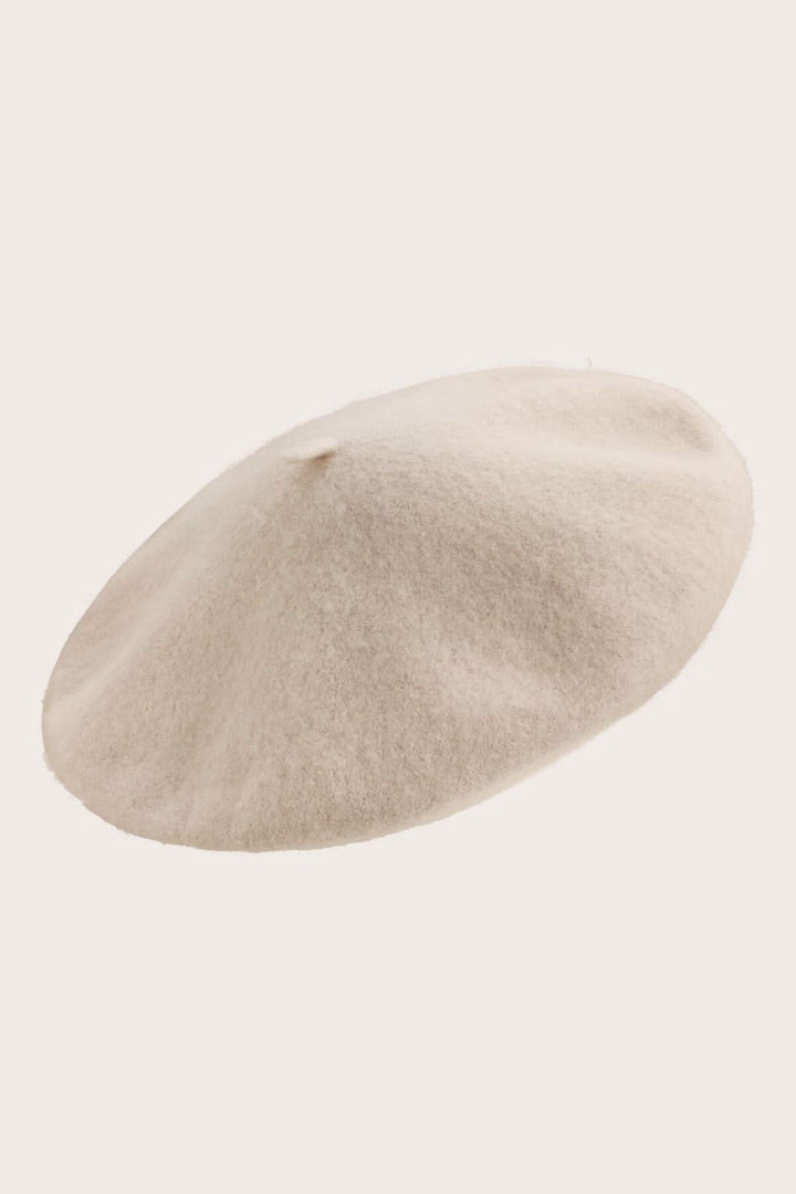 Chapeau Anett en laine douce, élégant béret féminin de couleur beige, parfait pour rehausser toute tenue.