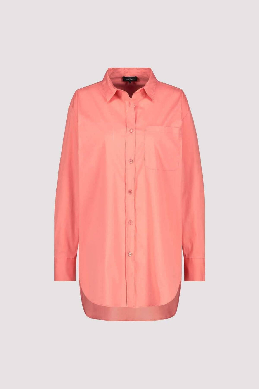 Chemise en coton rose à manches longues, col classique, poche plaquée et coupe Regular Fit.