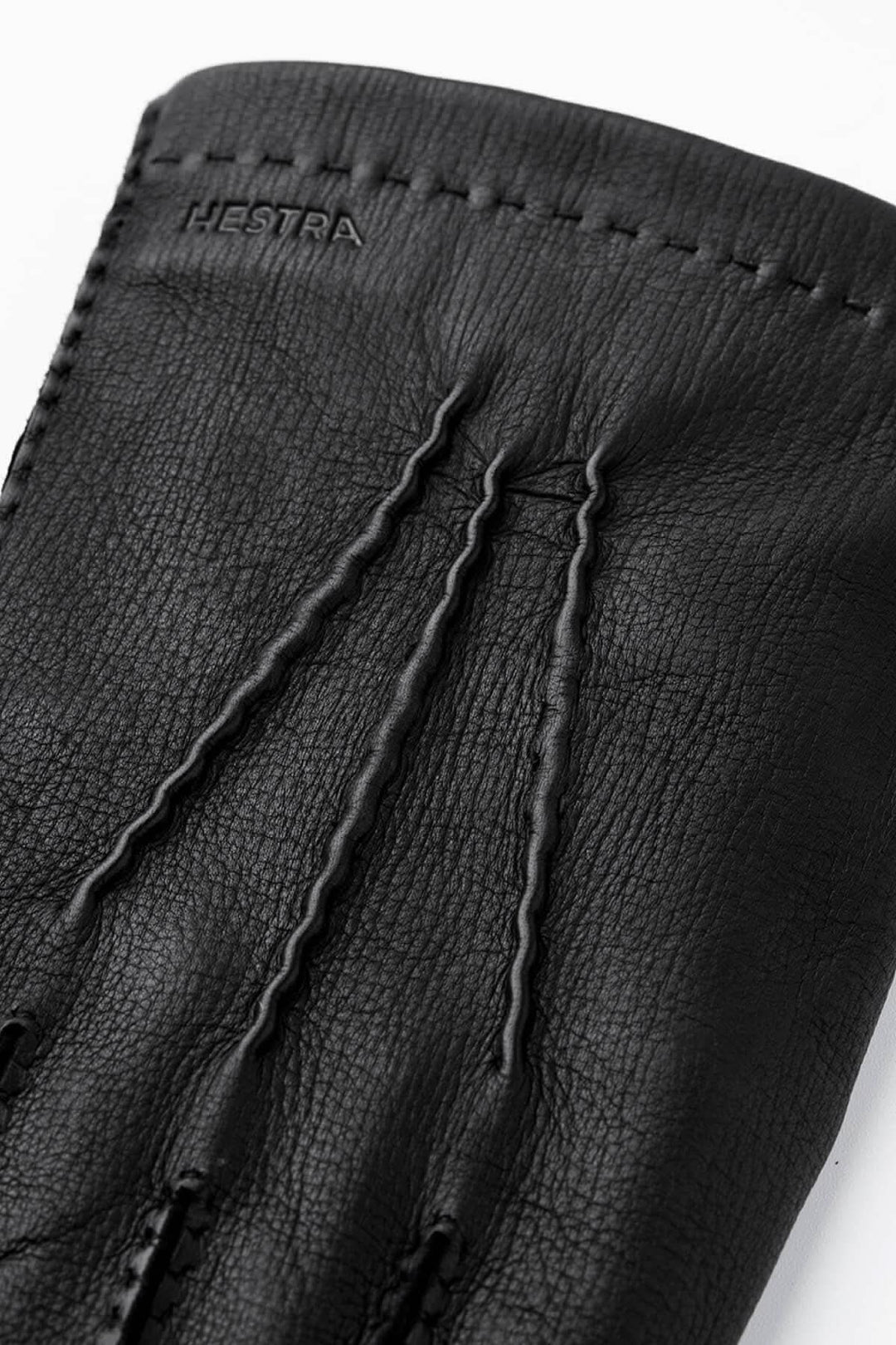 Gant de conduite Henry Hestra en cuir noir, élégant et de haute qualité, parfait pour le début de l'automne.