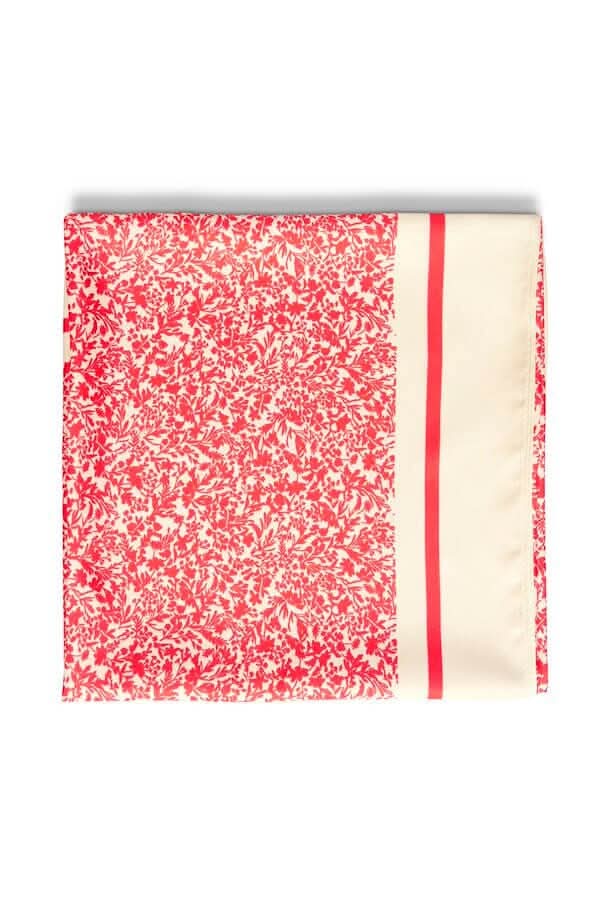 Foulard Namira en viscose avec imprimé floral rouge et crème, élégant et versatile pour toutes occasions.